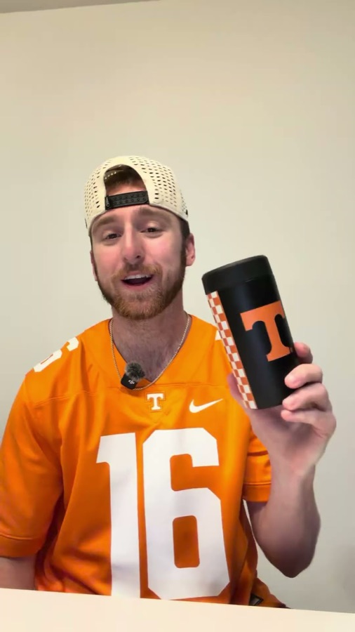 On-camera demo: Sam in a Tennessee Vols jersey introducing a Tennessee Frost Buddy can cooler