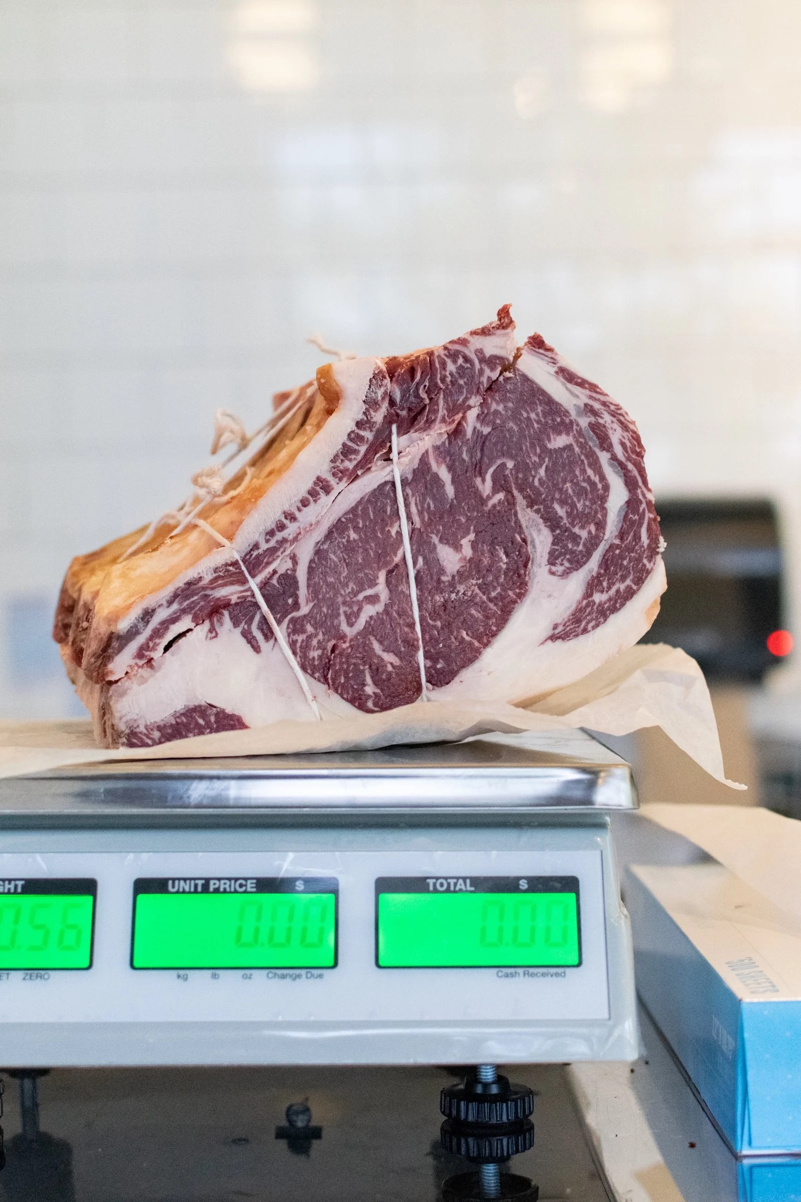Dry-aged ribeye on the butcher's scale, Bare Bones Butcher
