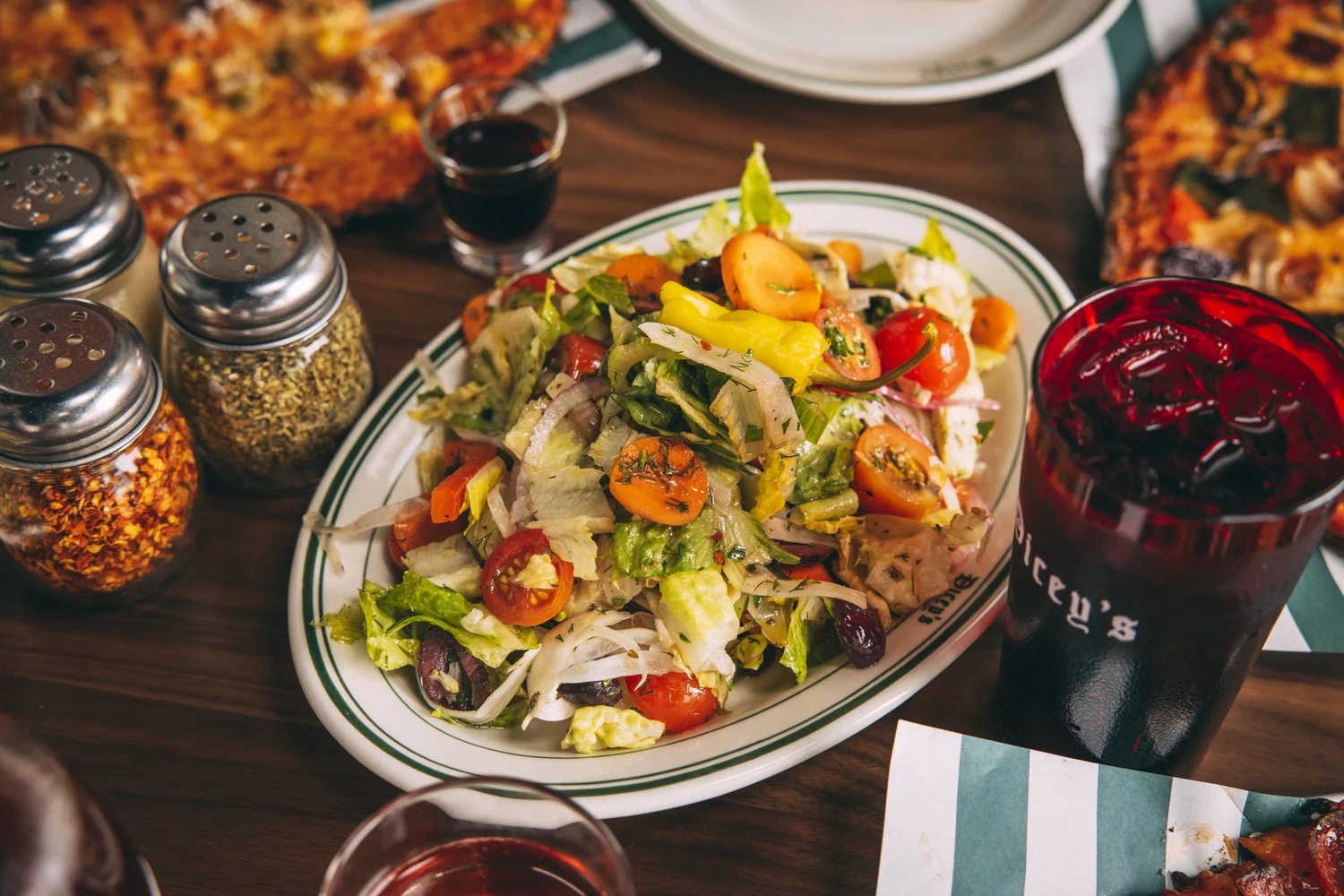 Greek salad and pizza, Dicey's Tavern