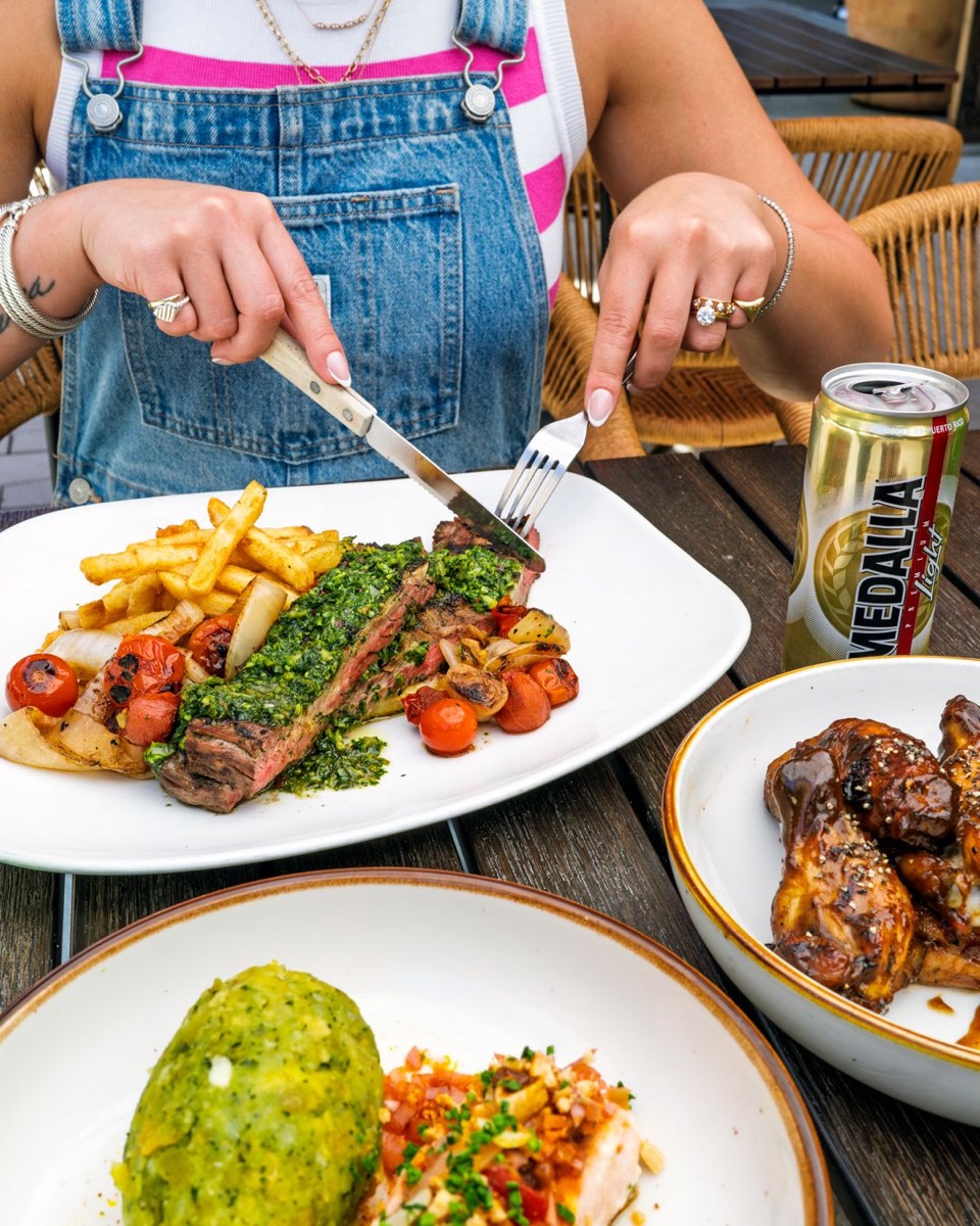 Steak with chimichurri and fries, glazed chicken and mofongo, El Super Pan at The Battery