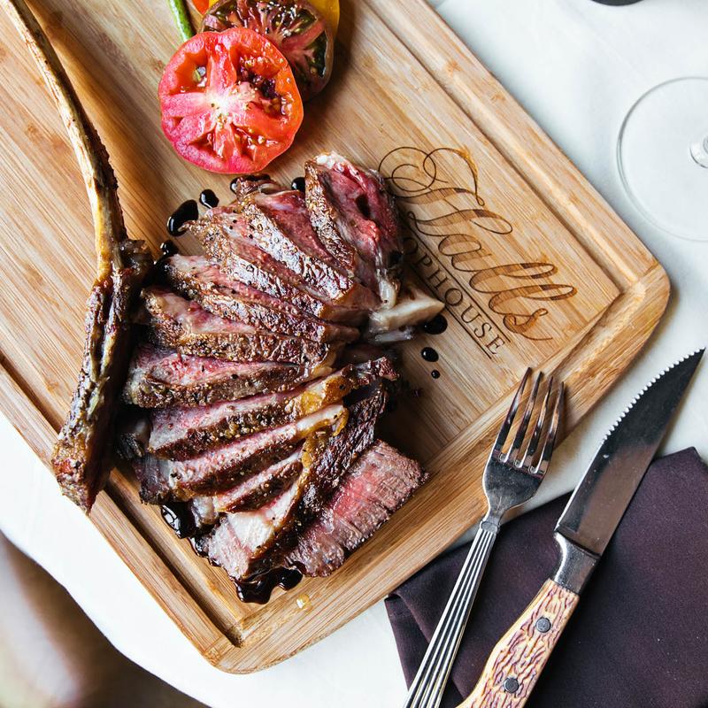 Sliced steak on a Halls Chophouse cutting board
