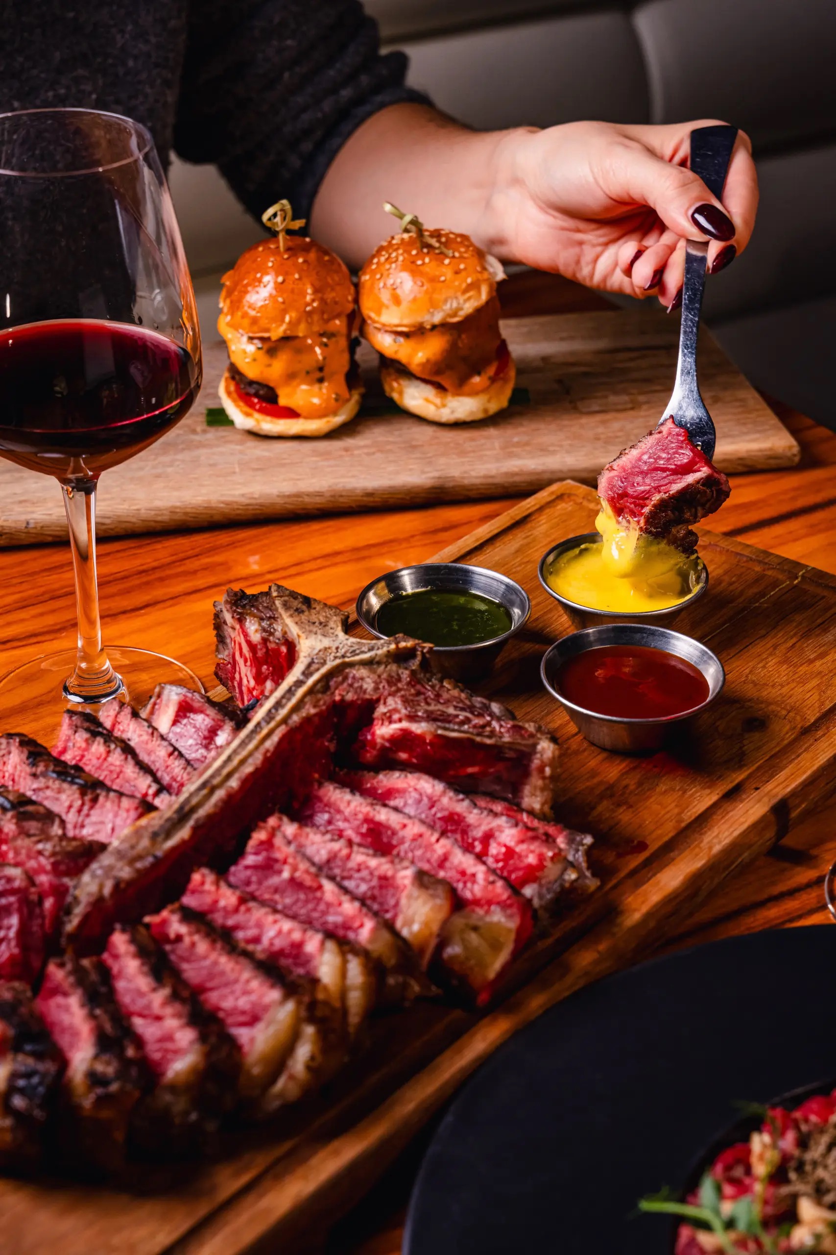 Steak platter with sliders and dipping sauces, STK Nashville