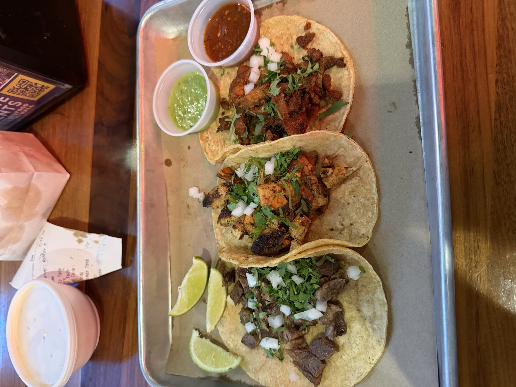 Sam's order: chicken, steak, and pastor tacos with red and green salsa, Chilangos Tacos