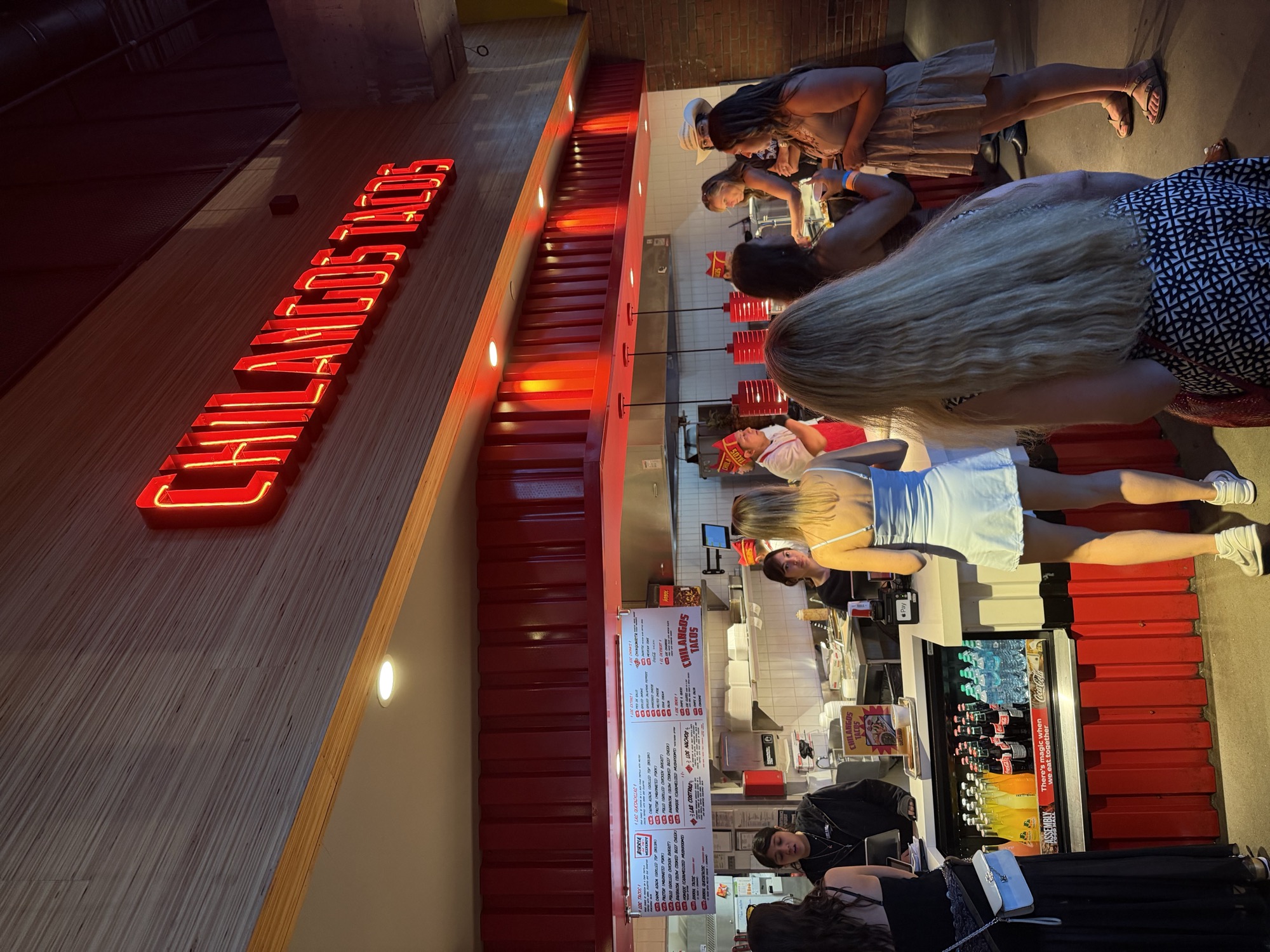 Chilangos Tacos counter and menu board inside Assembly Food Hall, Nashville