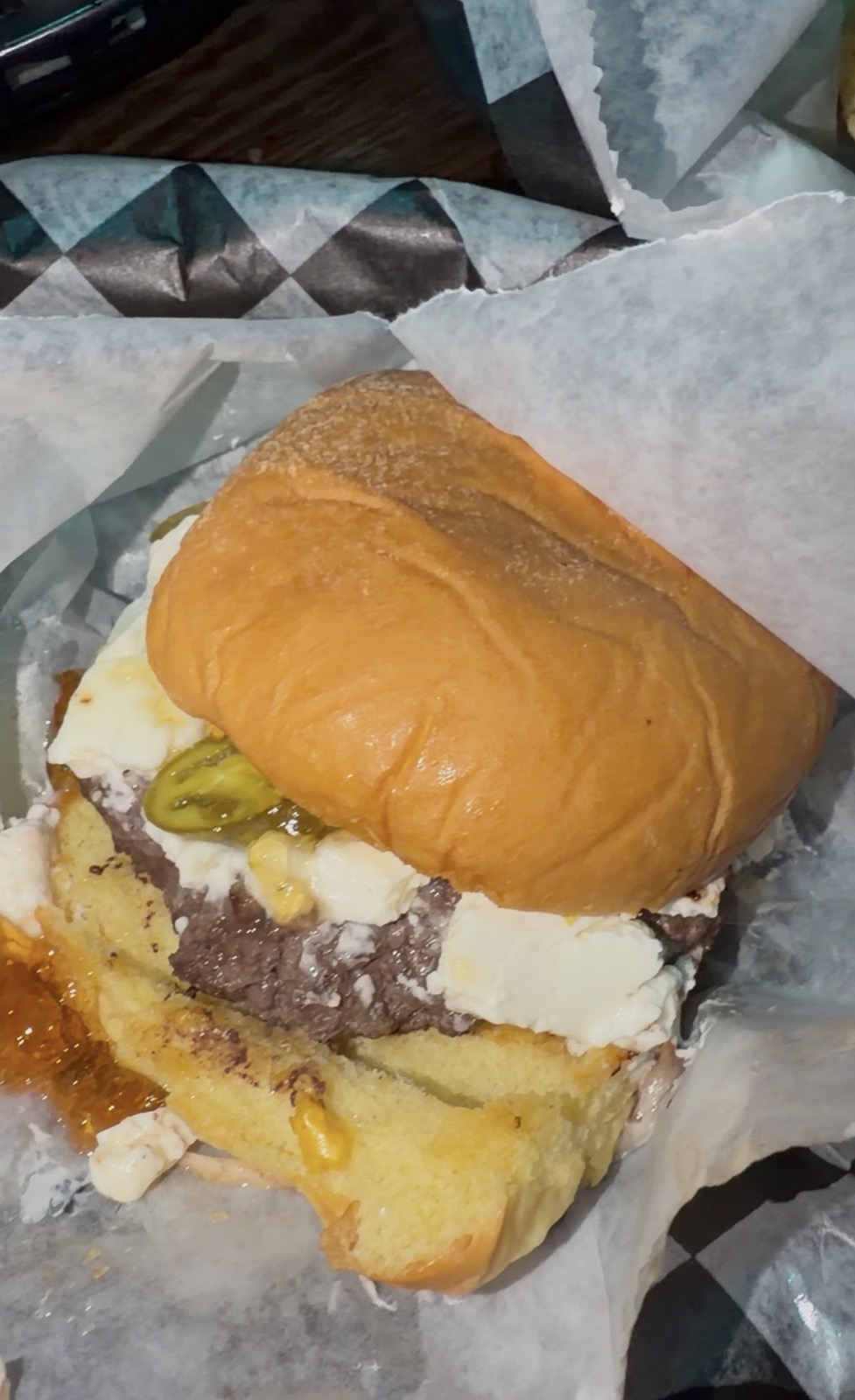 One of Sam's burgers, topped with jalapeños, Jack Brown's
