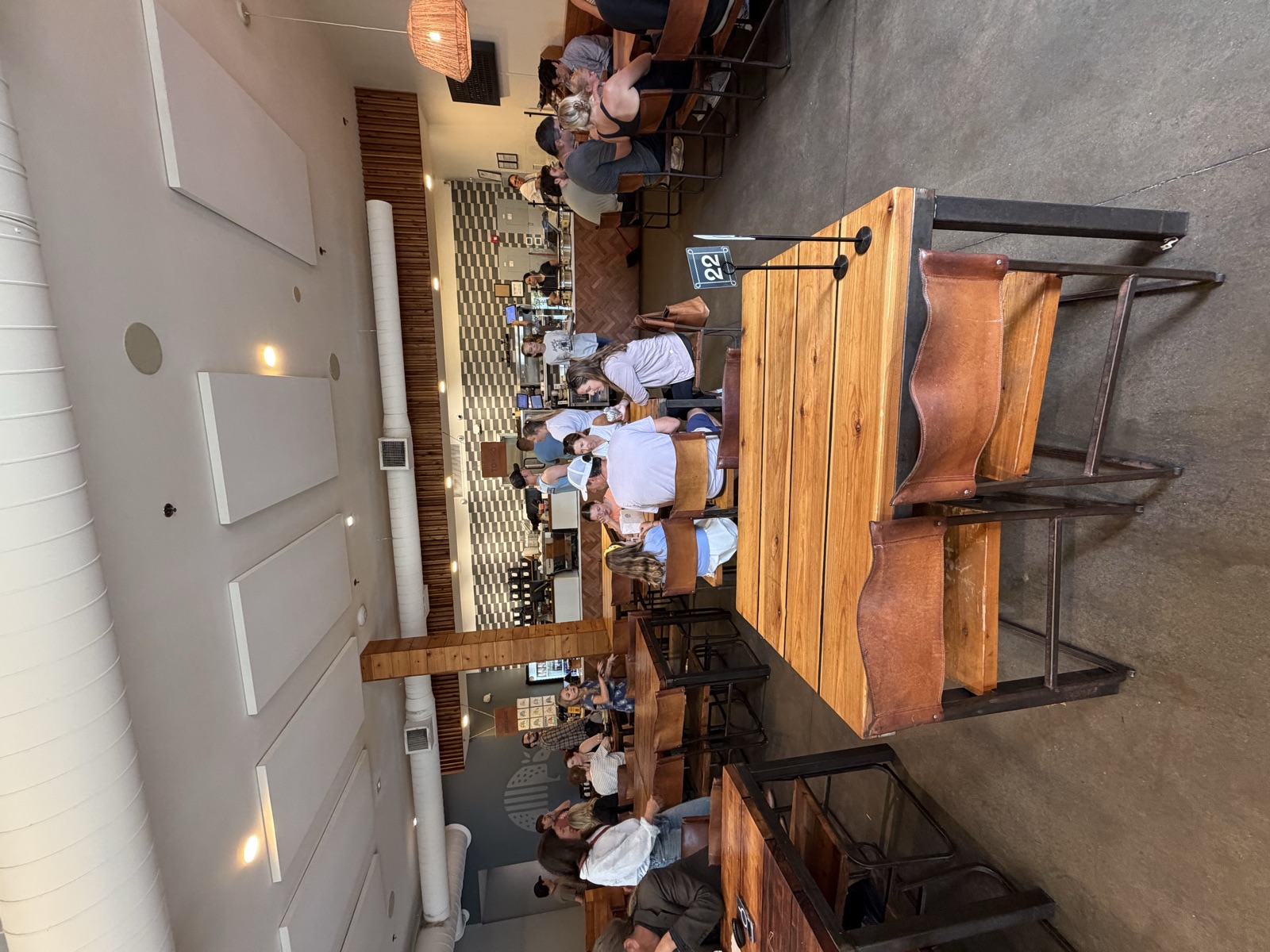 Inside Ladybird Taco, communal tables and counter