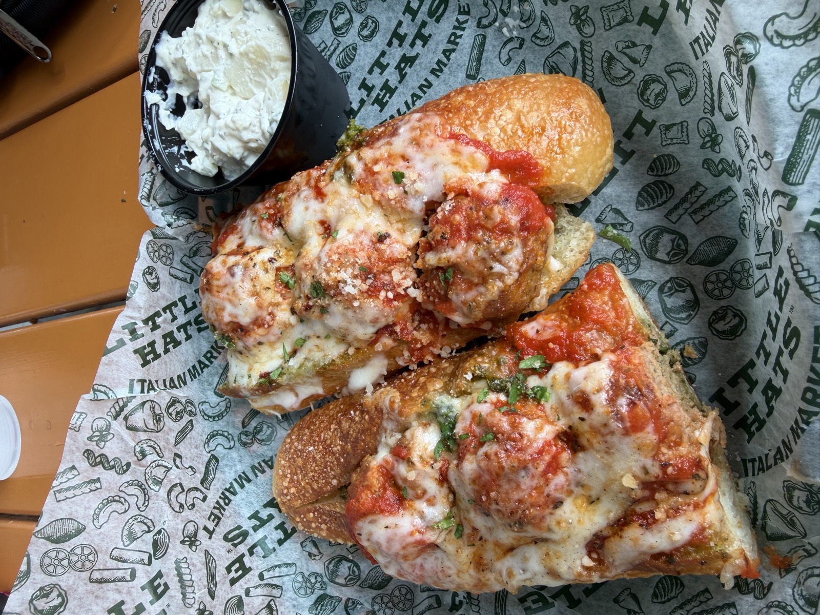 Sam's order: the Meatball Parmesan sub, meatballs under melted cheese and marinara on a toasted roll