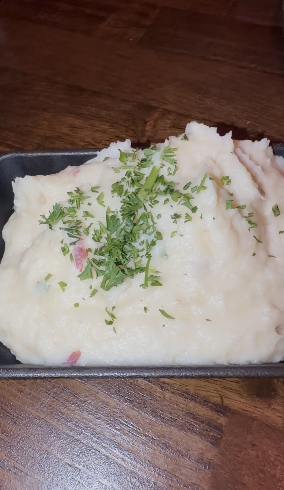 Sam's order: Garlic Mashed Potatoes topped with chopped parsley, McGuire's Irish Pub