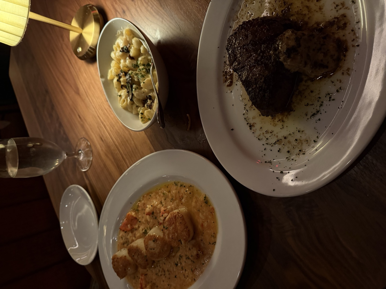 10oz Filet Mignon with black garlic butter, Sea Scallops, and black truffle mac and cheese, Ocean Prime