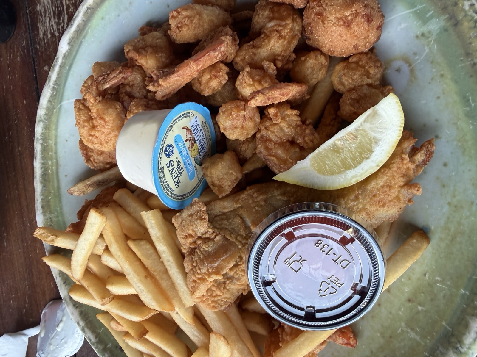 Sam's order: the Panhandle Seafood Platter with fried shrimp, fish, hushpuppy and fries, Sharky's