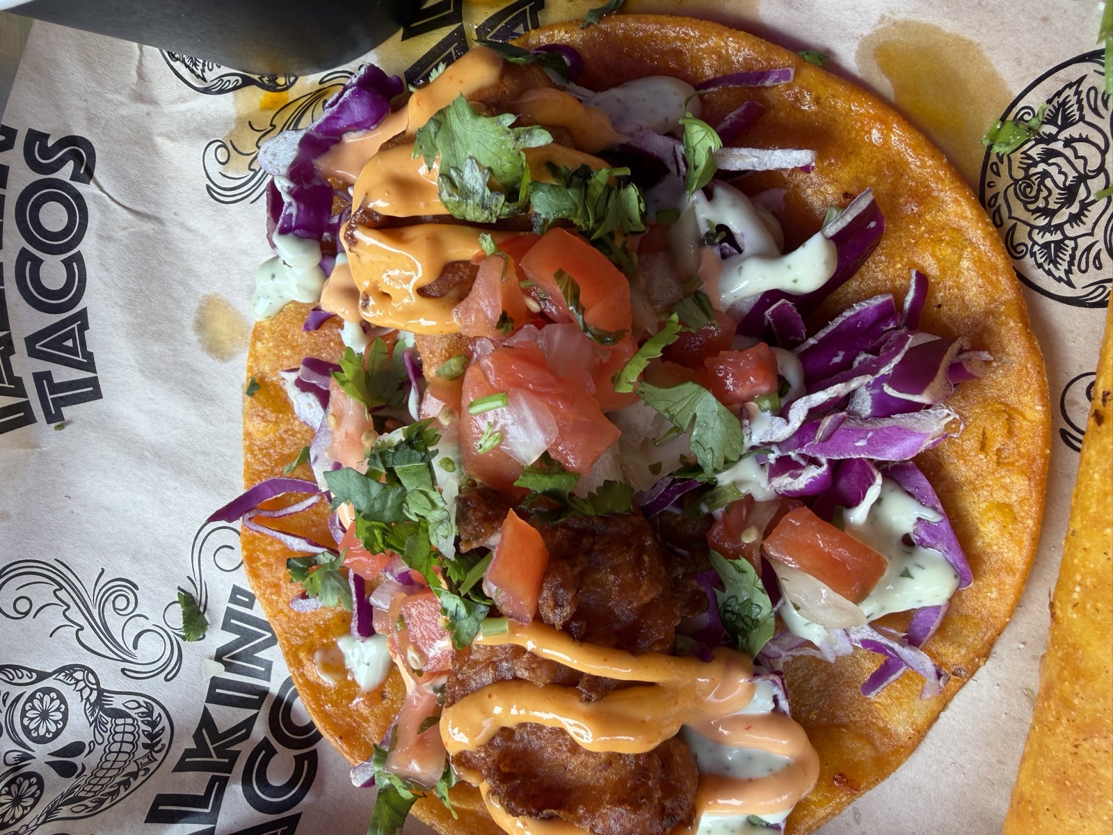 Sam's order: the Bang Bang Shrimp taco with fried shrimp, red cabbage, pico and two sauces