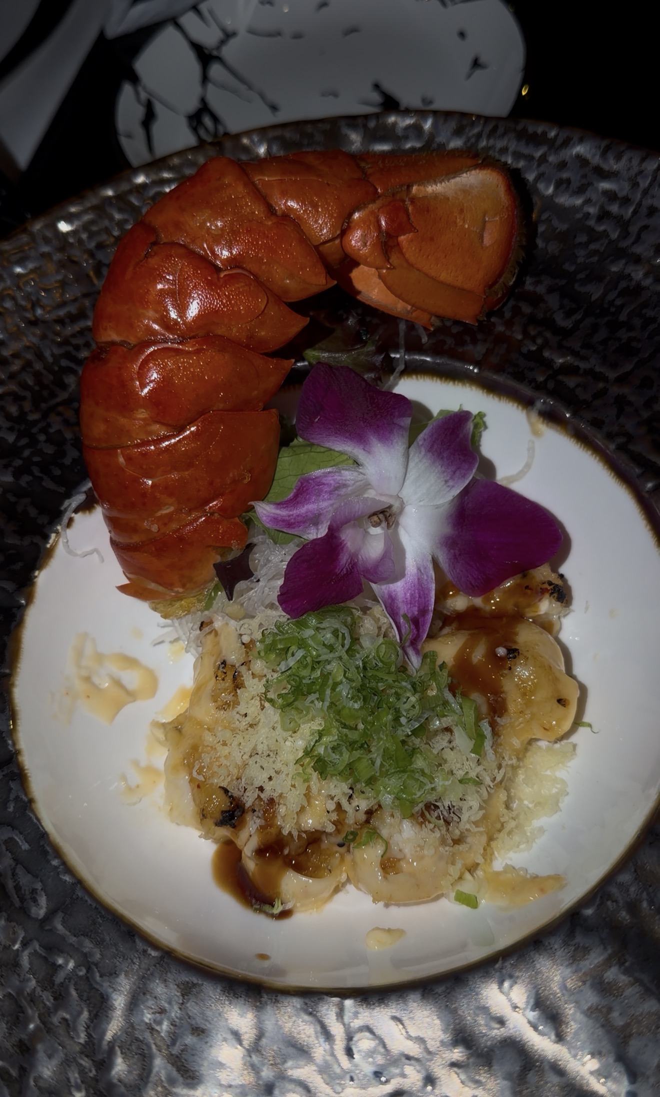 Sam's order: the Volcanic Lobster with a lobster tail and an orchid garnish, Thai Samurai