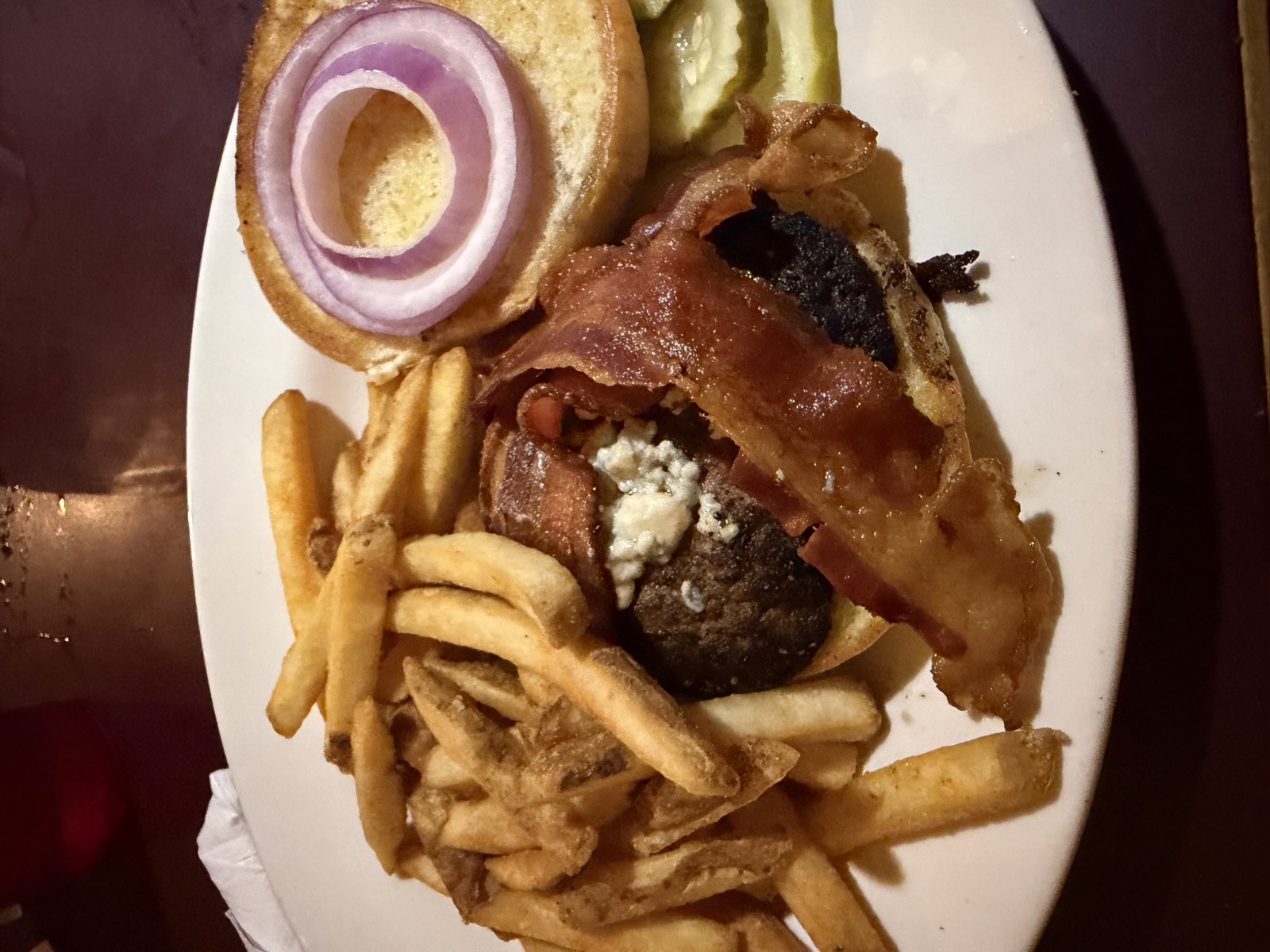 Sam's order: the Black & Bleu Burger with blue cheese crumbles and bacon, served with fries